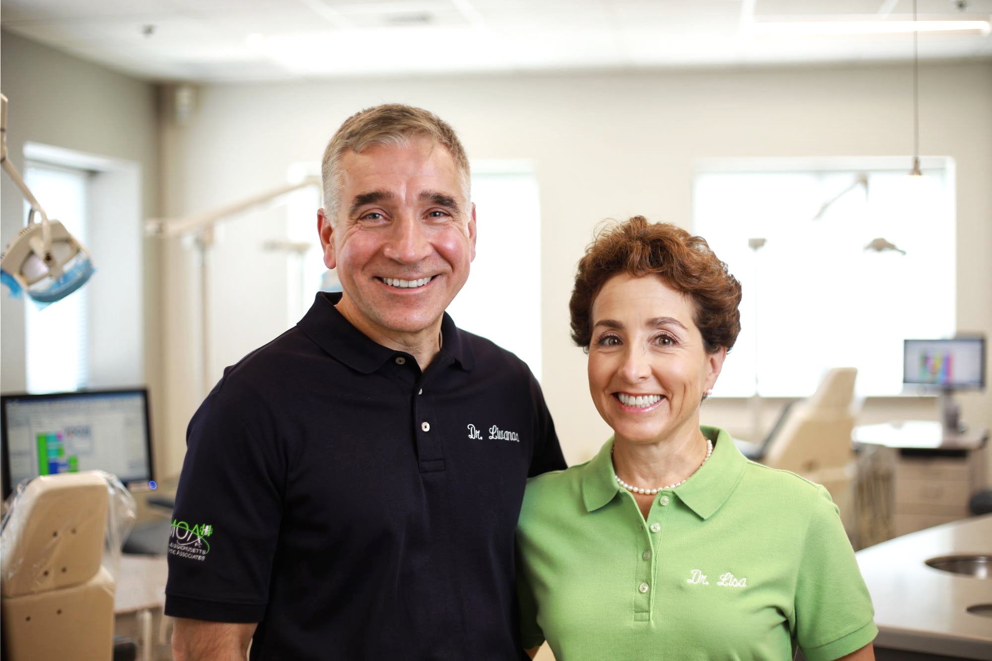 dr-livanos-and-dr-giarrusso-smiling Doctors smiling together