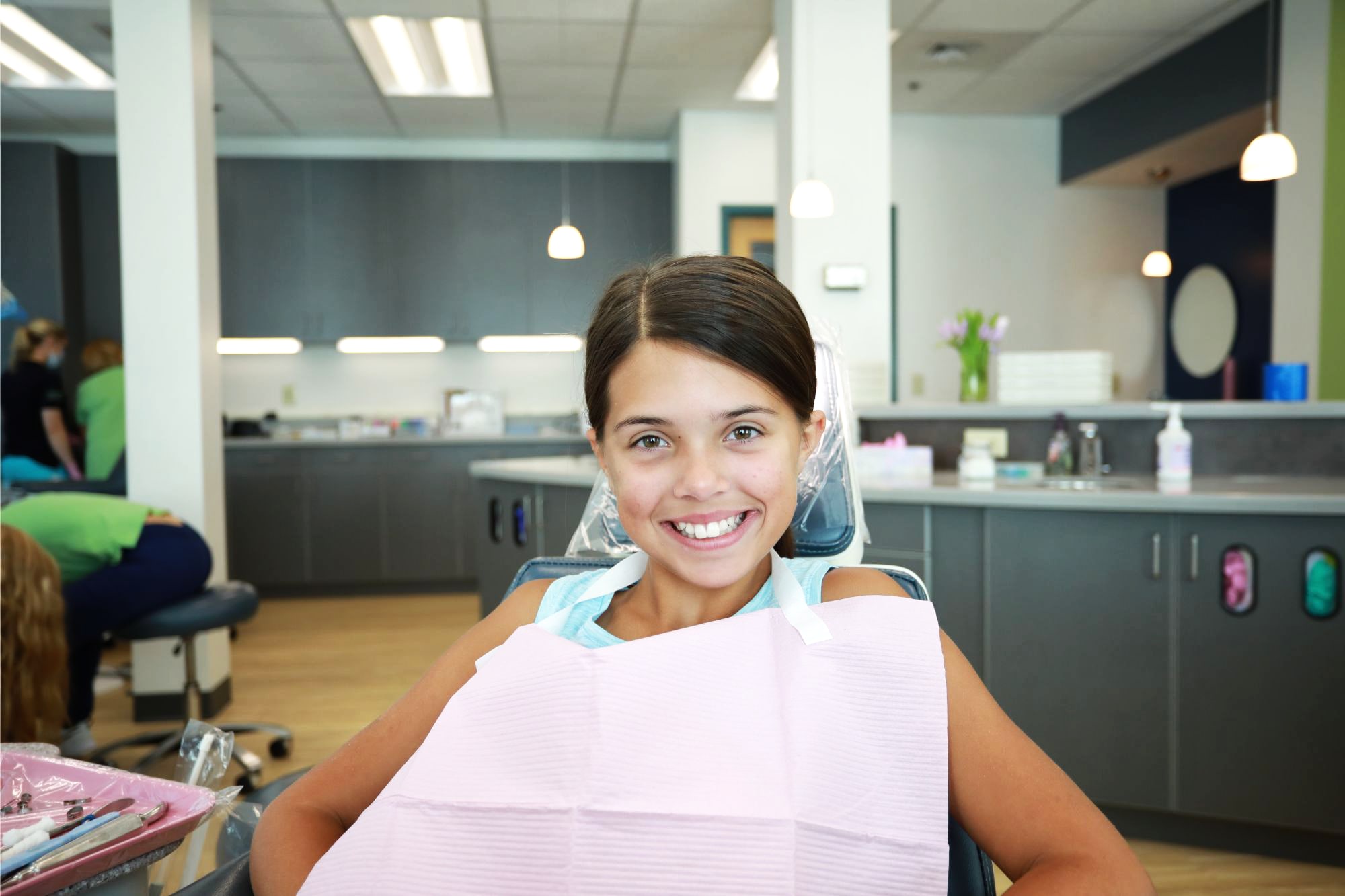 team member and patient smiling