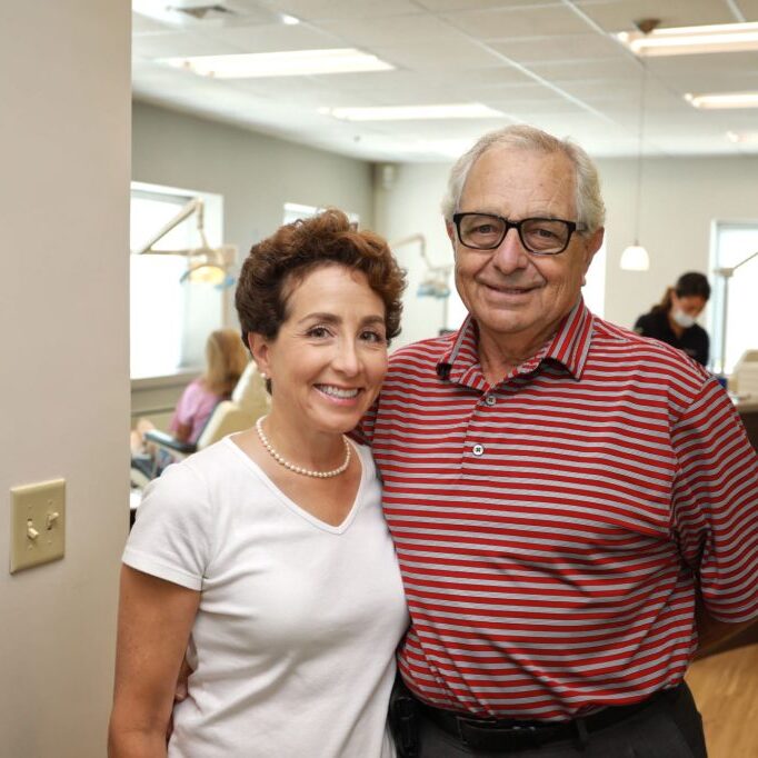 Doctor smiling with an older male patient